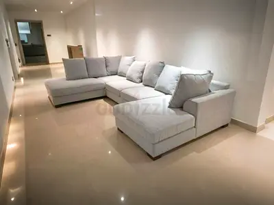 The one Kingstone Stylish Grey U-Shaped Sofa for Modern Living Spaces