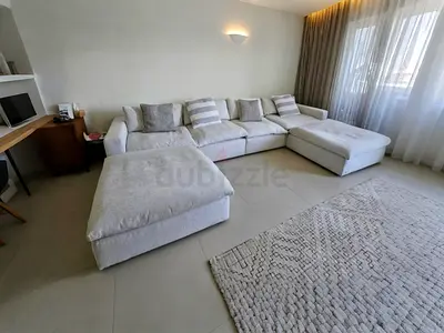 The One Stylish L-Shaped Sofa with Ottomans