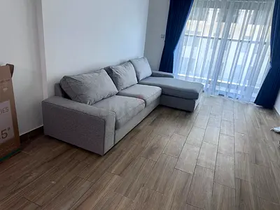 IKEA Stylish Grey L-Shaped Sofa - Perfect for Any Living Room!
