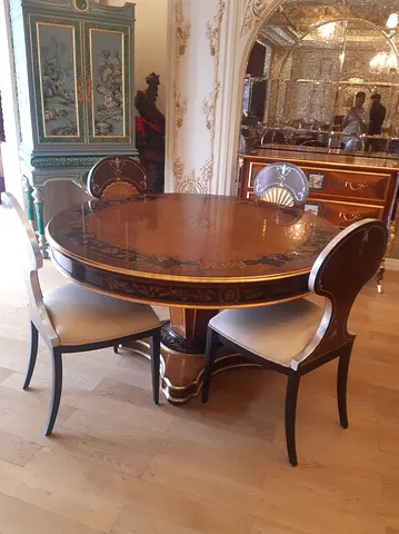Elegant Round Dining Table with Stylish Chairs