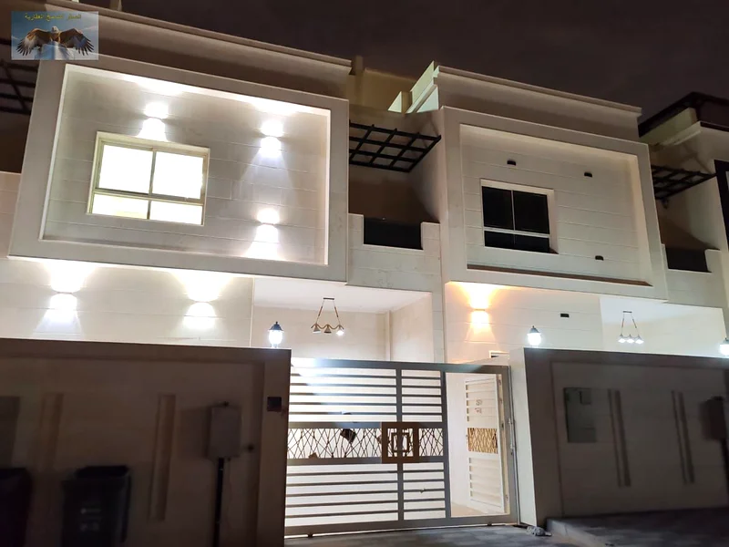 A luxurious villa with a modern design in Al Zahia, Ajman, 4 master bedrooms, a living room, and a spacious kitchen with excellent finishes, close to63240107713666117