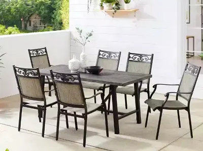 7-Piece Cast Aluminum Outdoor Dining Set with 6 Stackable Chairs and Table