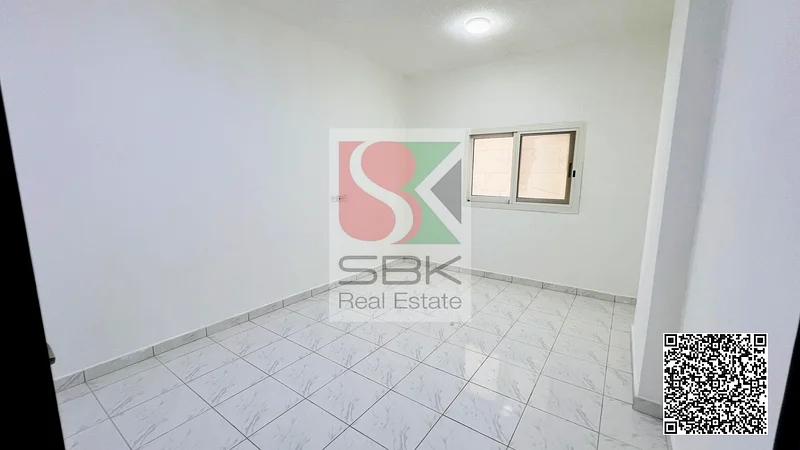 شقة واسعة مكونة من غرفة نوم واحدة للايجار في راشدية 2، عجمان63401975731329113
