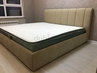 Stylish King-Size Bed with Plush Headboard