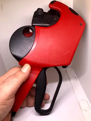 An old Heavy-Duty Labeling Gun for Efficient Inventory Management