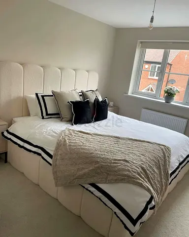 Elegant and Cozy Bed Frame with Chic Decor