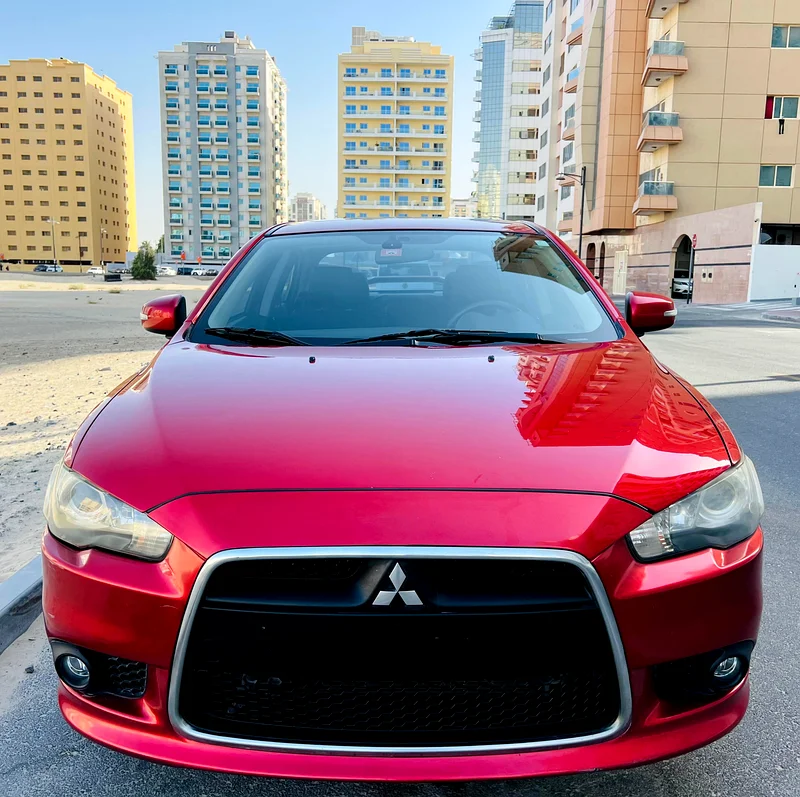 ميتسوبيشي لانسر جي تي موديل 2015 أحمر مواصفات خليجية مرجع.929363398581770370111