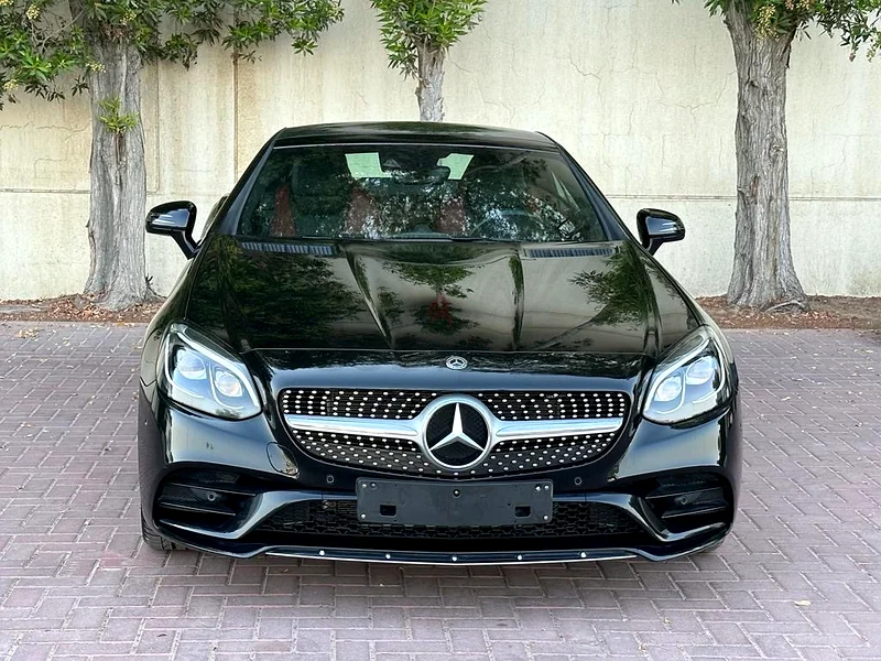 FOR SALE: BLACK BEAUTY WITH A ROOF THAT PLAYS PEEKABOO 
(Mercedes SLC 200 Hard-Top Convertible)63399918013443114