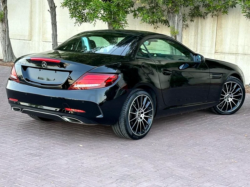 FOR SALE: BLACK BEAUTY WITH A ROOF THAT PLAYS PEEKABOO 
(Mercedes SLC 200 Hard-Top Convertible)63399918013443112