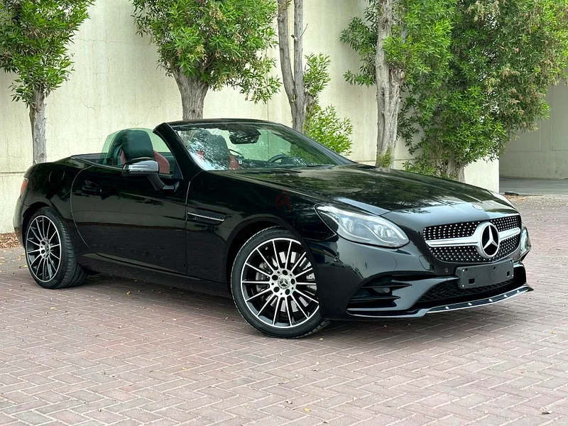 FOR SALE: BLACK BEAUTY WITH A ROOF THAT PLAYS PEEKABOO 
(Mercedes SLC 200 Hard-Top Convertible)63399918013443111
