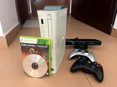 Xbox 360 + 2 controllers one game and Kinect sensor
