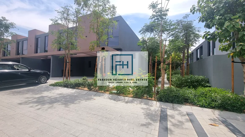 🌿 For Rent: 4-Bedroom Park-Facing Townhouse in Masaar Community63654745531139110