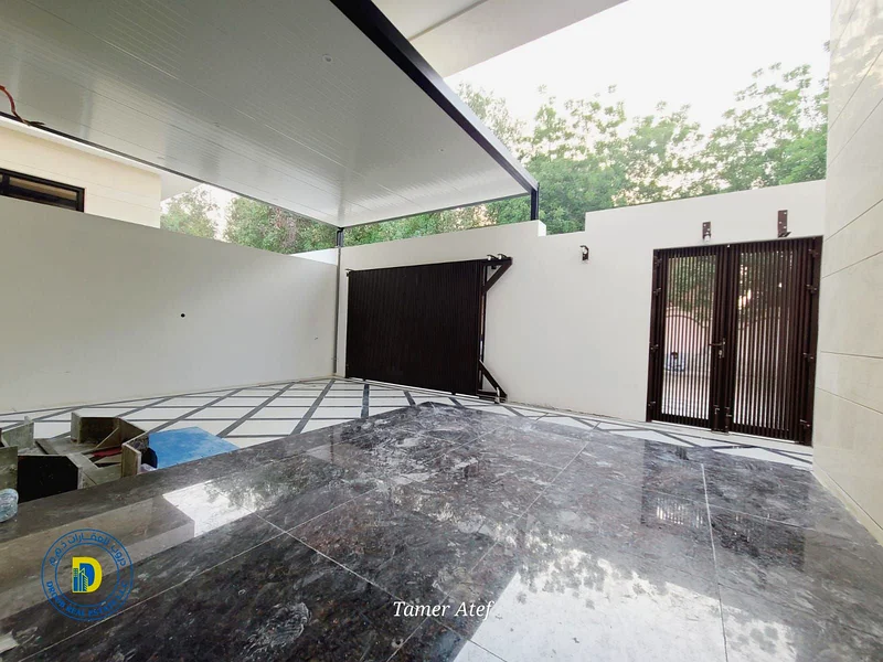 For sale, a modern villa 6 rooms and a roof, including AC, opposite a mosque in Al Mowaihat 3 , bank financing, freehold63869923862274113