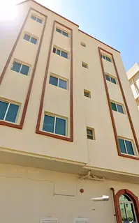 For sale, a residential investment building, ground floor and 4 floors, in Ajman, Al Bustan area