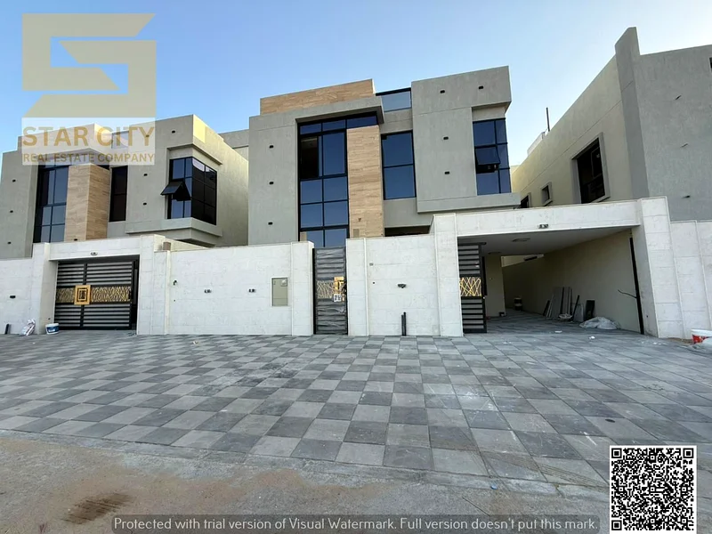 Villa for sale in Ajman, Al Bahia area: Majlis, 2 halls, 5 master bedrooms, maid's room, and garden - freehold - no down payment63883087733505111