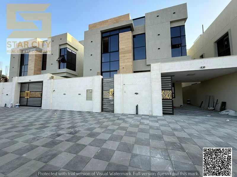 Villa for sale in Ajman, Al Bahia area: Majlis, 2 halls, 5 master bedrooms, maid's room, and garden - freehold - no down payment63883087733505112