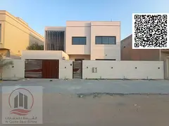 Villa For sale in Ajman Al Rawdah 5 master bedrooms, a living room, a hall, and a maid’s room, fre