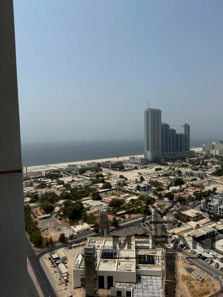 The best model in Ajman, with a completely open view of the sea and the city, 3 rooms and a hall with a maid’s room, large area, high floor63866308084354111