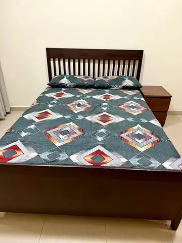 Furnished Master Room with sharing bathroom in CBD Family Building - International City