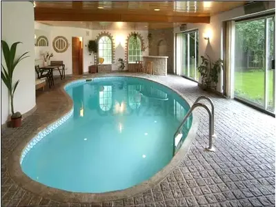 Stunning Indoor Swimming Pool with Beautiful Ambiance