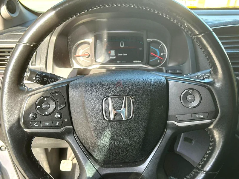 Honda Pilot. 2019 model Silver colour . Very good condition. No accident at all. 90 % Original paint63398539672962113