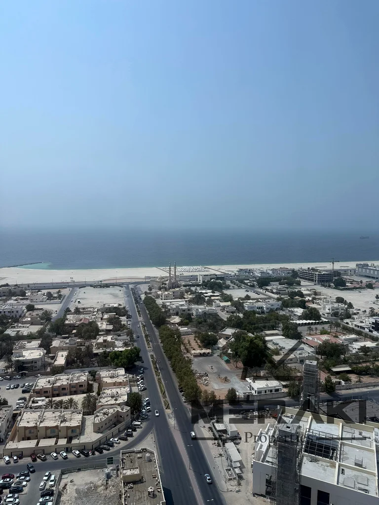 The best model in Ajman, with a completely open view of the sea and the city, 3 rooms and a hall with a maid’s room, large area, high floor63866308084354112