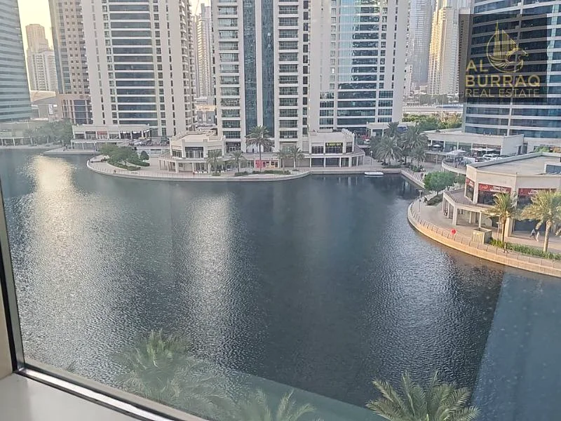 مع إطلالة كاملة على البحيرة | شقة بغرفة نوم واحدة في برج ليك شور جيه إل تي | مؤجرة63987419816323114