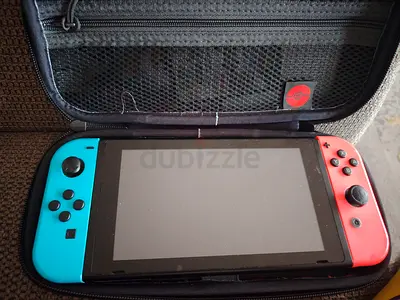Nintendo Switch with 10 games and Pokémon case/slots