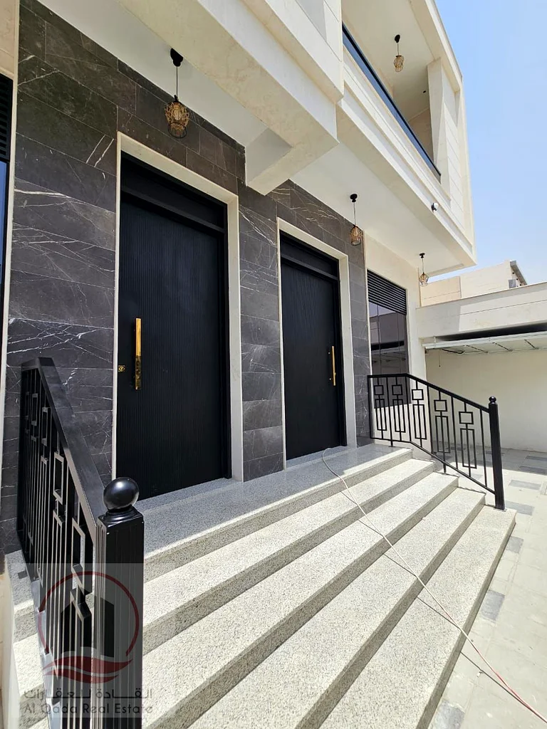 Villa for sale, including central air conditioning, in Ajman Al Bahia, 5 master bedrooms, a living room, a maid's room, freehold for all nationalities63883087705730111