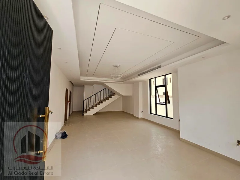 Villa for sale, including central air conditioning, in Ajman Al Bahia, 5 master bedrooms, a living room, a maid's room, freehold for all nationalities63883087705730112