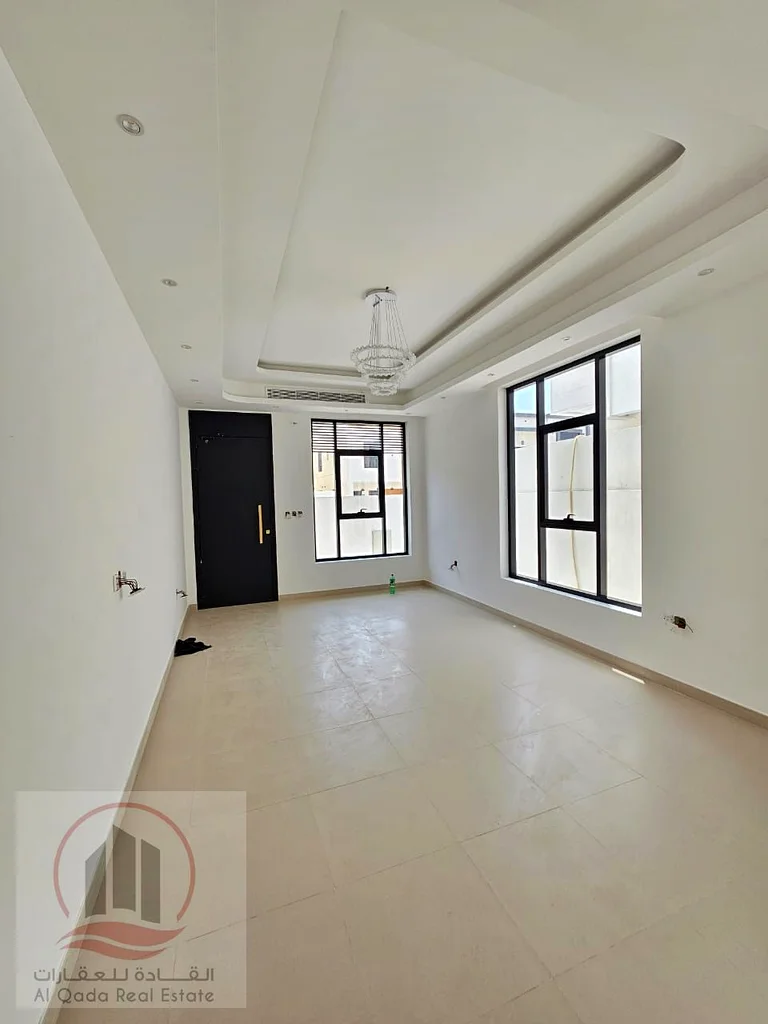 Villa for sale, including central air conditioning, in Ajman Al Bahia, 5 master bedrooms, a living room, a maid's room, freehold for all nationalities63883087705730113