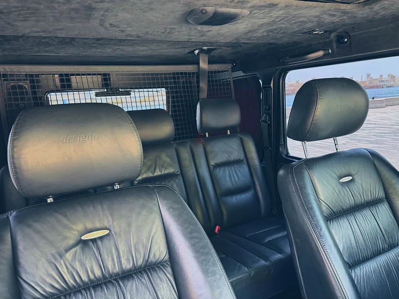 مرسيدس بنز G55 - مواصفات الخليج، لون أسود مع كيت جسم G6363399921458178113
