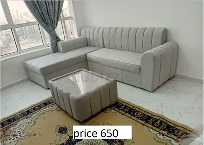 L SHAPE BRAND NEW WITH TABLE AND PILLOW
