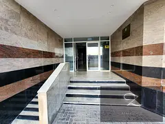 Building for sale in Sharjah, Al Butina area, prime location on a main street