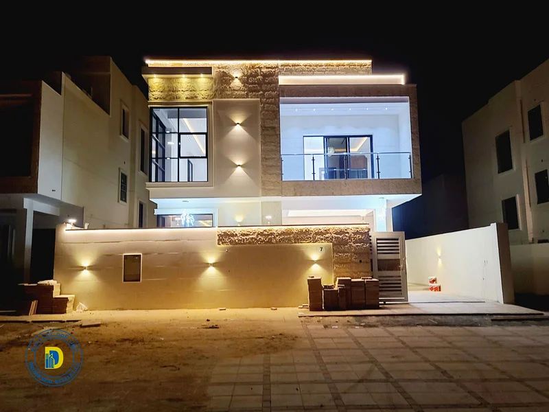For sale, a luxurious villa with 6 rooms and a roof, Al Helio 2, Ajman, including registration fees, bank financing, freehold for all nationalities63909885842690110