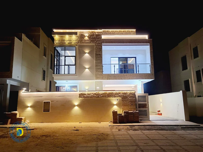 For sale, a luxurious villa with 6 rooms and a roof, Al Helio 2, Ajman, including registration fees, bank financing, freehold for all nationalities63909885842690111
