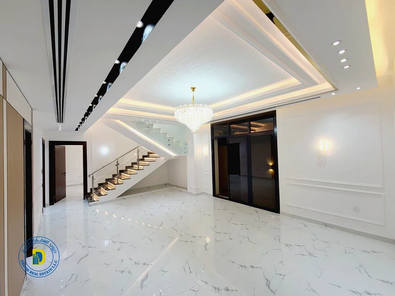 For sale, a luxurious villa with 6 rooms and a roof, Al Helio 2, Ajman, including registration fees, bank financing, freehold for all nationalities63909885842690114