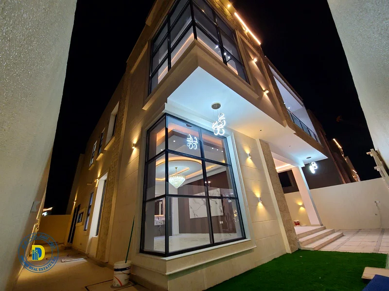 For sale, a luxurious villa with 6 rooms and a roof, Al Helio 2, Ajman, including registration fees, bank financing, freehold for all nationalities63909885842690113