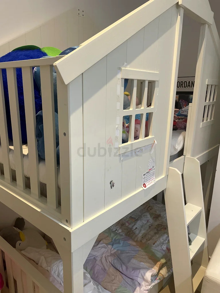 Tree House Twin-Over-Twin Bunk Bed (Pottery Barn) with its