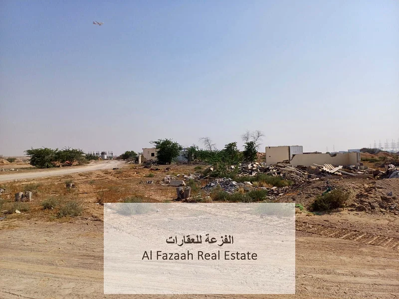 For sale in Sharjah, Al Qasimia City, Nizwa, vacant land, area 11,948 square feet, industrial permit, freehold warehouses for all nationalities, excel63821147173762111