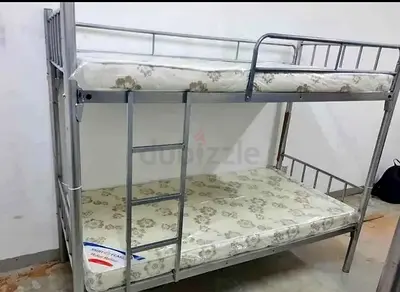 Brand new Silver Bunk Bed with mattress for sale.