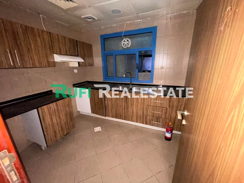 A room and a living room in Falcon Towers with a distinctive area and an excellent location in the heart of Ajman, plus a beautiful view63885883185539114