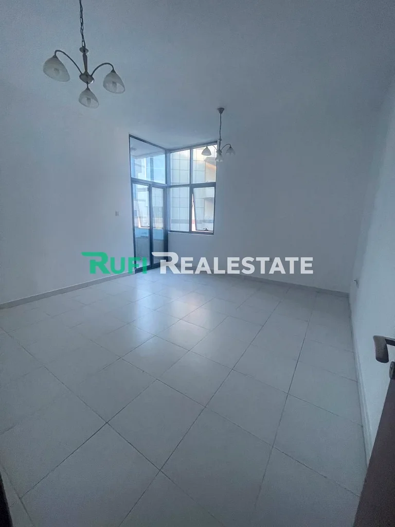 A room and a living room in Falcon Towers with a distinctive area and an excellent location in the heart of Ajman, plus a beautiful view63885883185539111