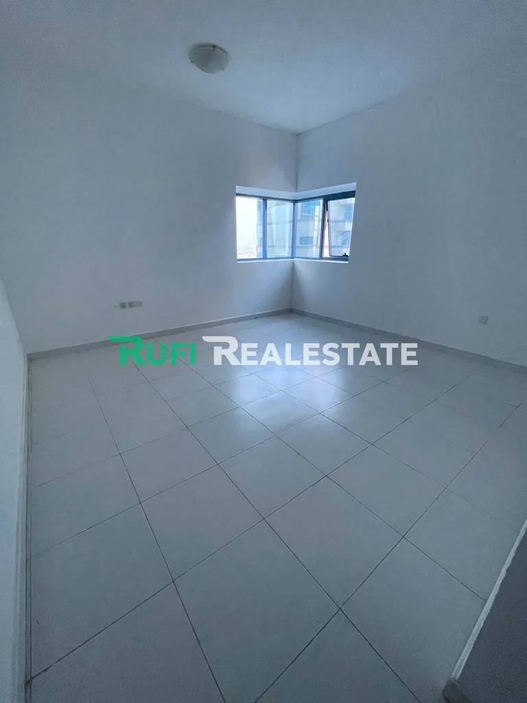 A room and a living room in Falcon Towers with a distinctive area and an excellent location in the heart of Ajman, plus a beautiful view63885883185539112