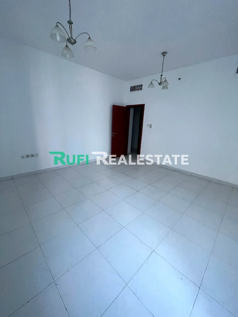 A room and a living room in Falcon Towers with a distinctive area and an excellent location in the heart of Ajman, plus a beautiful view63885883185539113