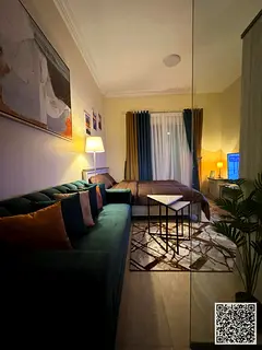 A fully furnished studio with a separate kitchen and a balcony with an open view, for monthly rent i