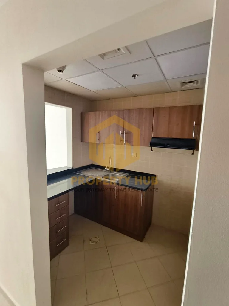 شقة بغرفة نوم واحدة مع موقف سيارات متاحة للبيع في أبراج عجمان وان63889910343553113