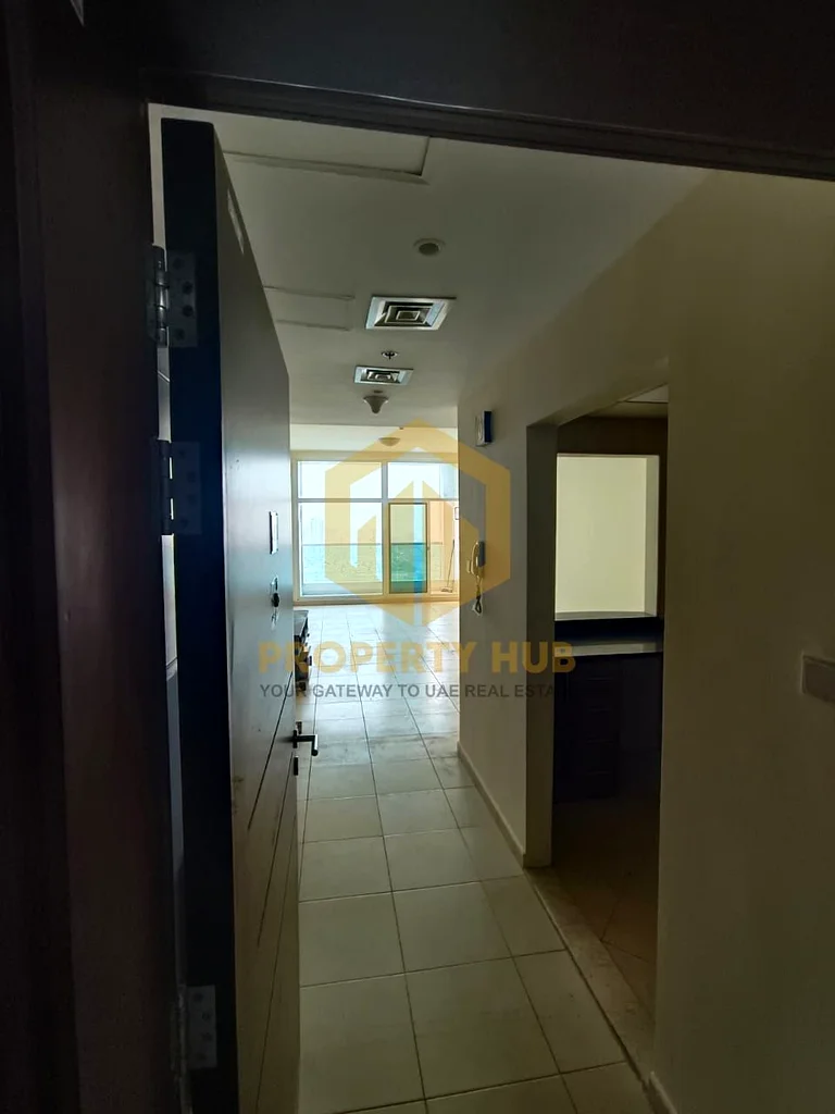 شقة بغرفة نوم واحدة مع موقف سيارات متاحة للبيع في أبراج عجمان وان63889910343553114