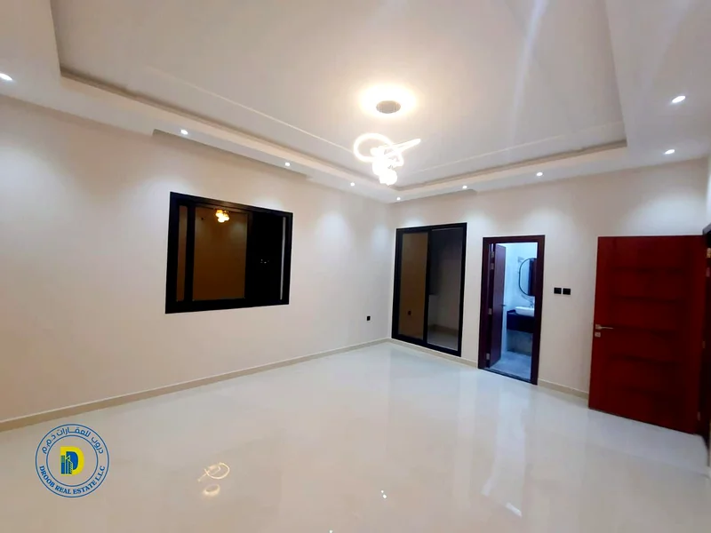فيلا للبيع في منطقة الحيلو 2، عجمان، تتكون من 4 غرف وسطح.63909333936513114