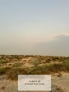 For sale, a residential corner plot in the Emirate of Sharjah, Al Matraq area